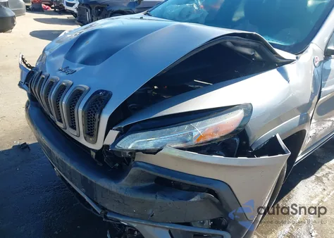 2015 Jeep Cherokee Trailhawk from USA, damaged, VIN 1C4PJMBS0FW527916